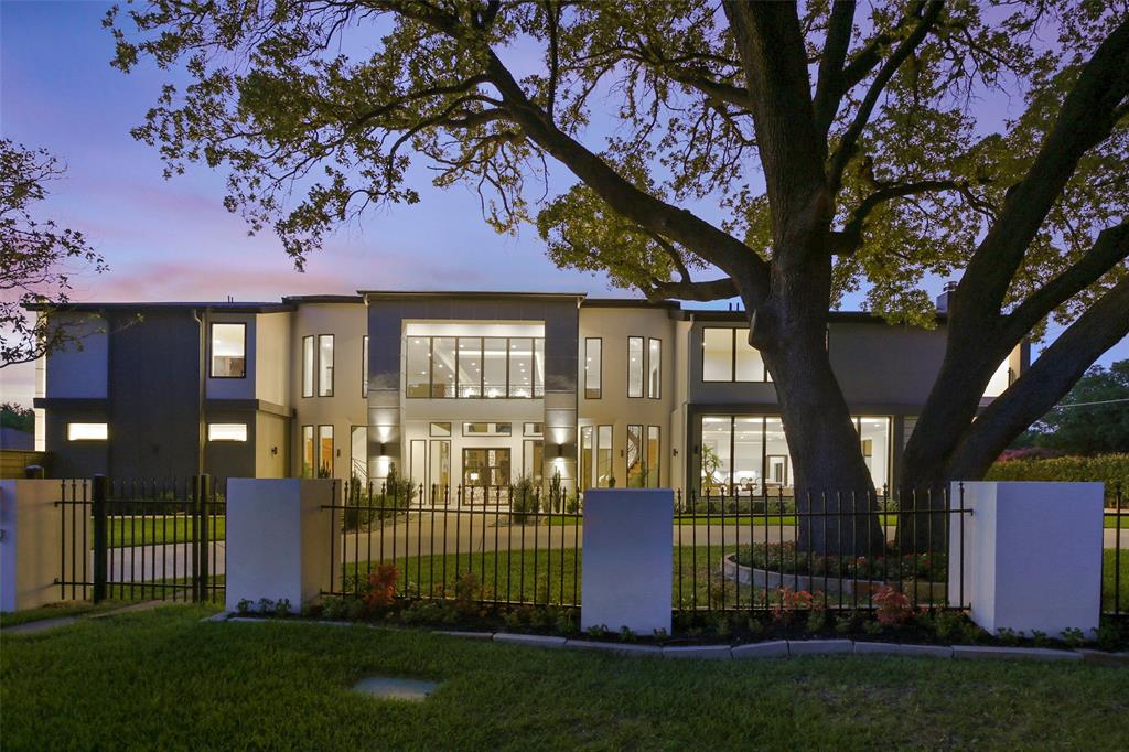 5959 Colhurst Street Dallas, TX 75230 - Photo 1 of 1 a front view of a house with a garden