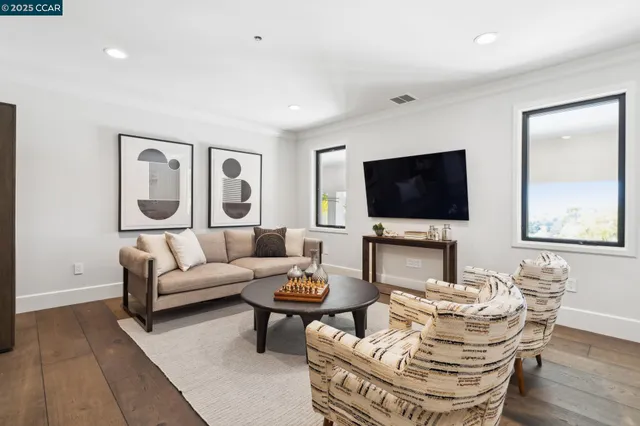 a view of a livingroom with furniture and window