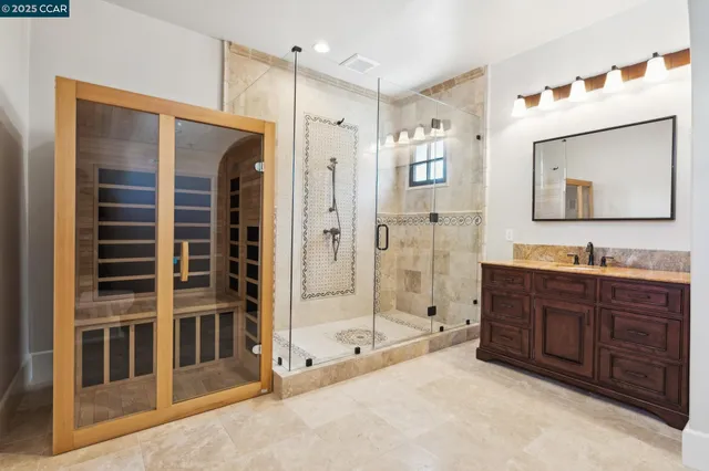 a dining room with furniture window and wooden floor