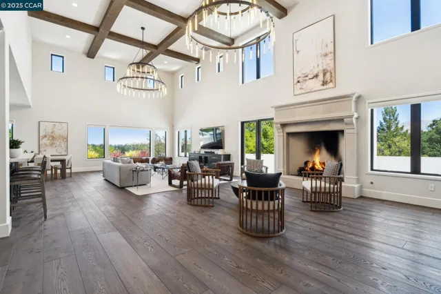 a spacious bathroom with a tub sink shower and mirror