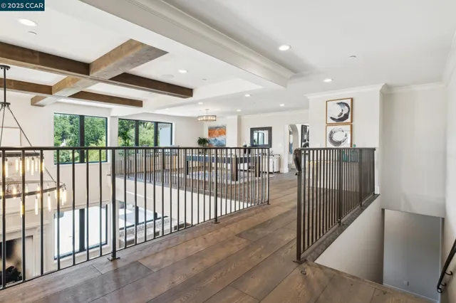 a view of a house with backyard porch and sitting area