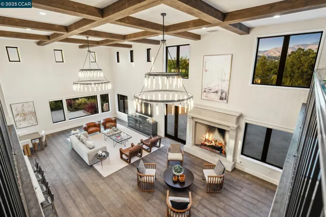 a kitchen with granite countertop a sink a stove and cabinets
