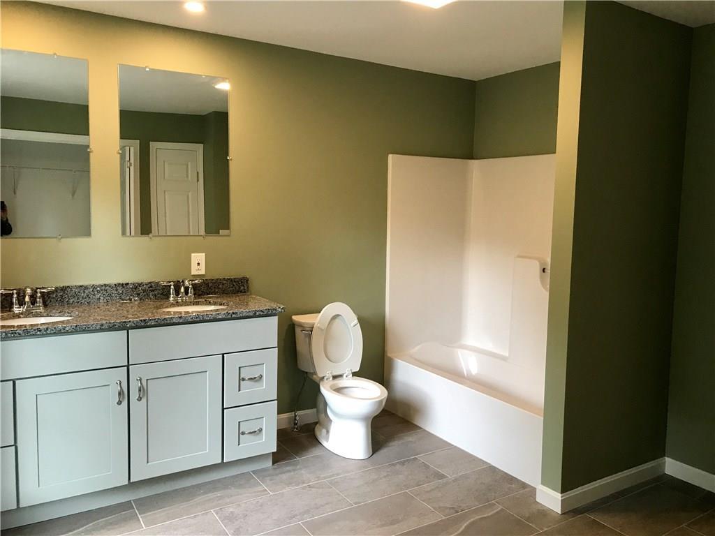 18 Ali Pond Road Berwick, ME 03901 - Photo 17 of 35 First floor full bathroom with W/D...
