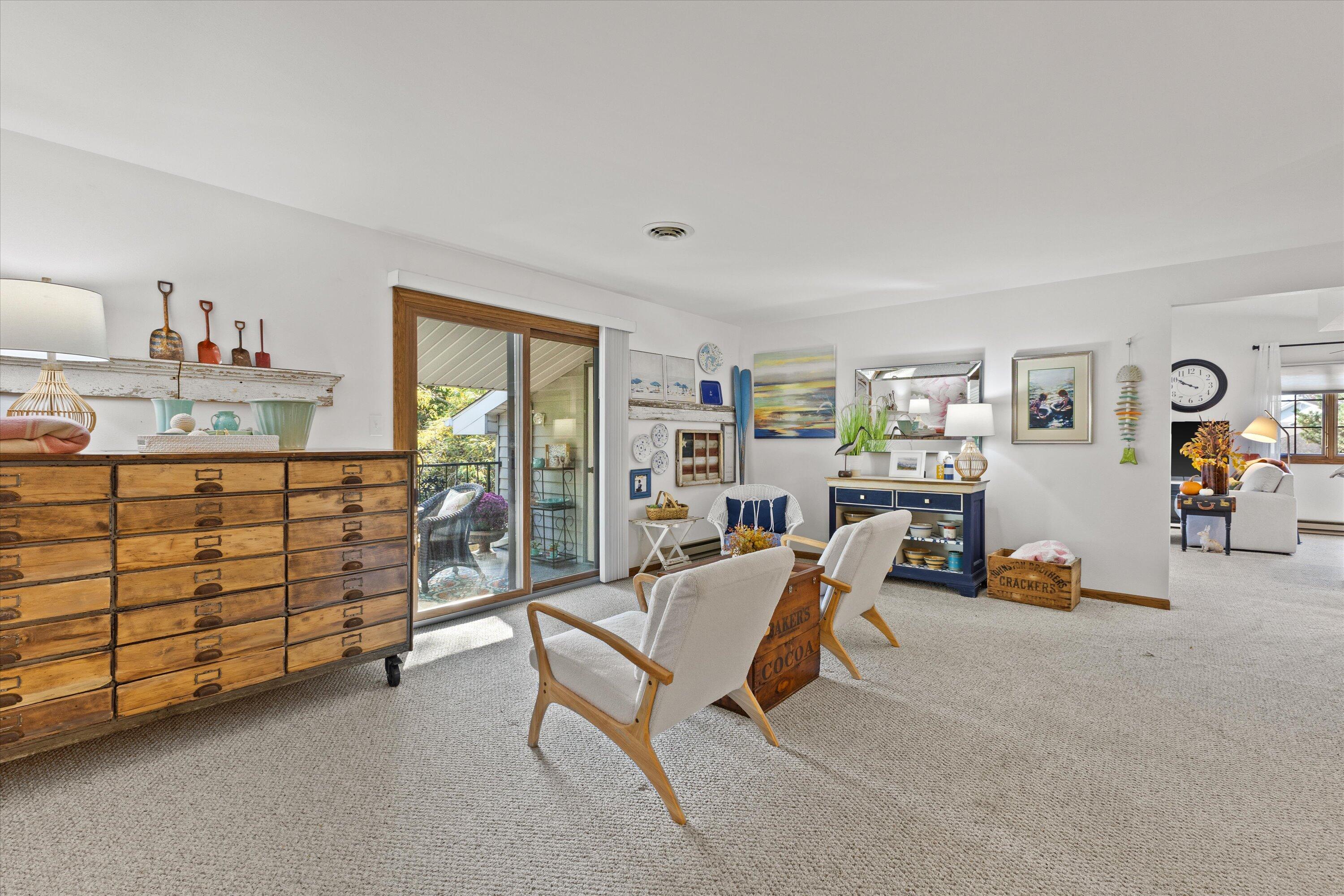 5810 Ring Neck Terrace, Unit 204 Mount Pleasant, WI 53406 - Photo 12 of 33 Patio doors let in more light, making it warm and inviting.