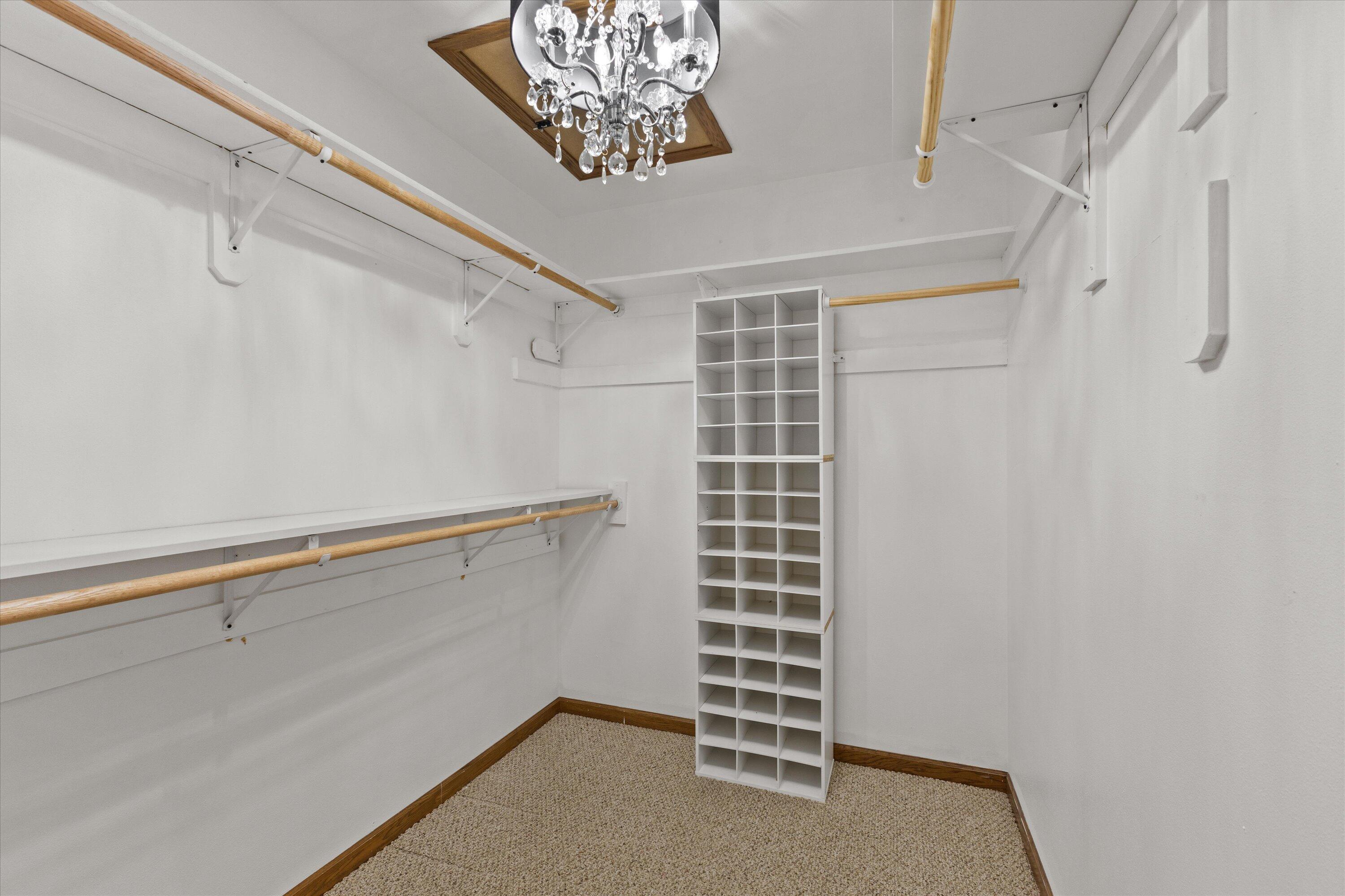 5810 Ring Neck Terrace, Unit 204 Mount Pleasant, WI 53406 - Photo 25 of 33 Plenty of space for hanging and cubby for storage.