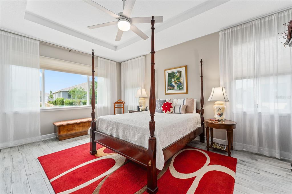 8290 Southwest 92nd Circle Ocala, FL 34481 - Photo 14 of 46 a bedroom with a bed and window