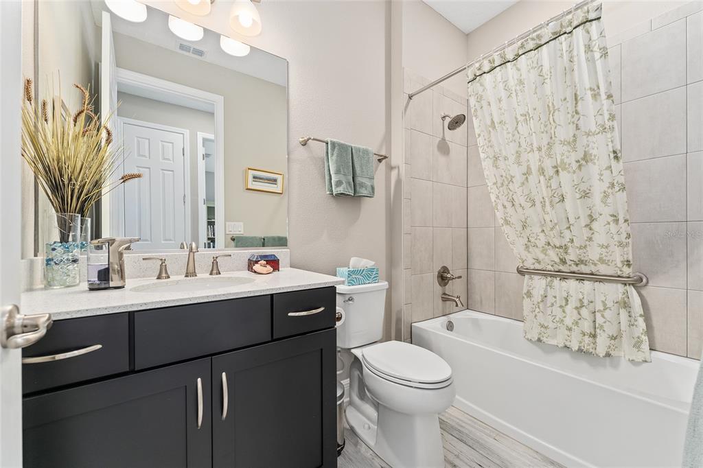 8290 Southwest 92nd Circle Ocala, FL 34481 - Photo 21 of 46 a bathroom with a sink a toilet and shower