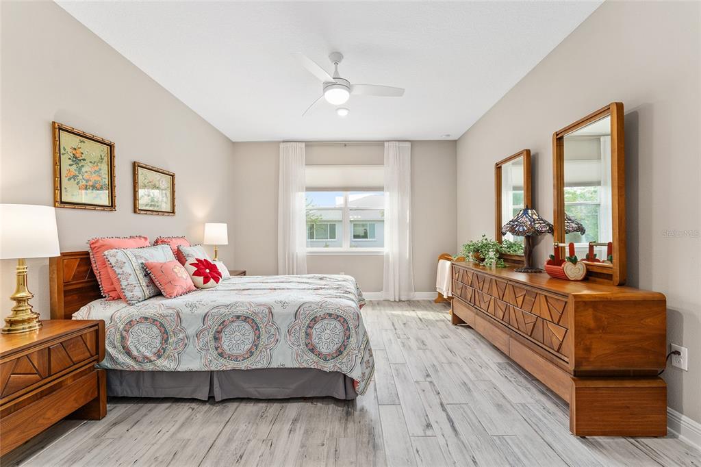 8290 Southwest 92nd Circle Ocala, FL 34481 - Photo 26 of 46 a bedroom with a bed and a window