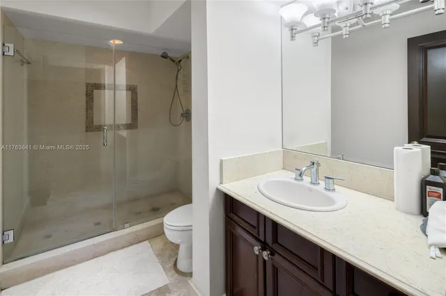 a view of a backyard with a sitting area and furniture