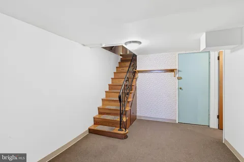 a view of entryway with stairs