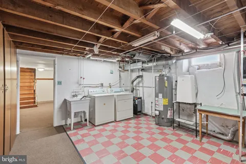 a utility room with cabinets