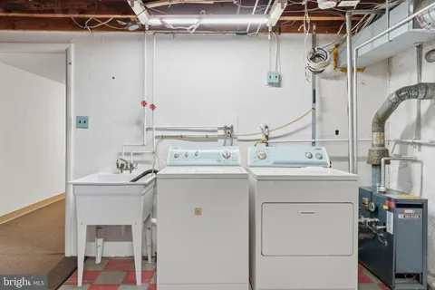 a utility room with a washer and dryer