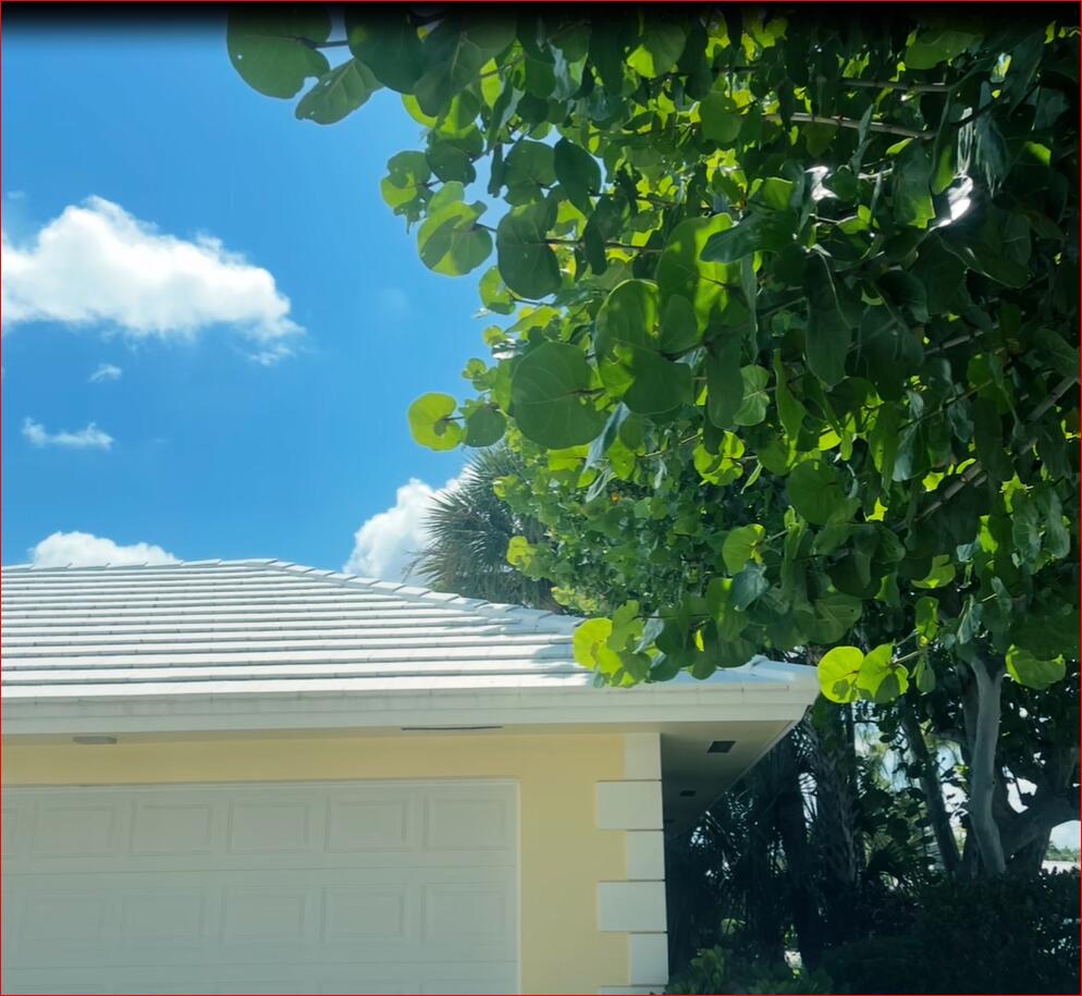 610 Juneberry Court Boca Raton, FL 33486 - Photo 5 of 11 a view of a house with a flower garden