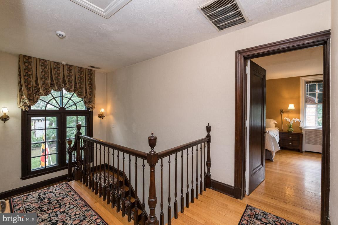 332 Suffolk Road Baltimore, MD 21218 - Photo 23 of 29 Second floor hall. Love the Palladian window.