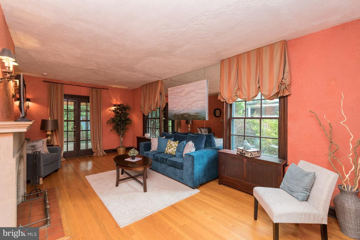 332 Suffolk Road Baltimore, MD 21218 - Photo 4 of 29 Windows...windows..windows and stunning FP mantle.