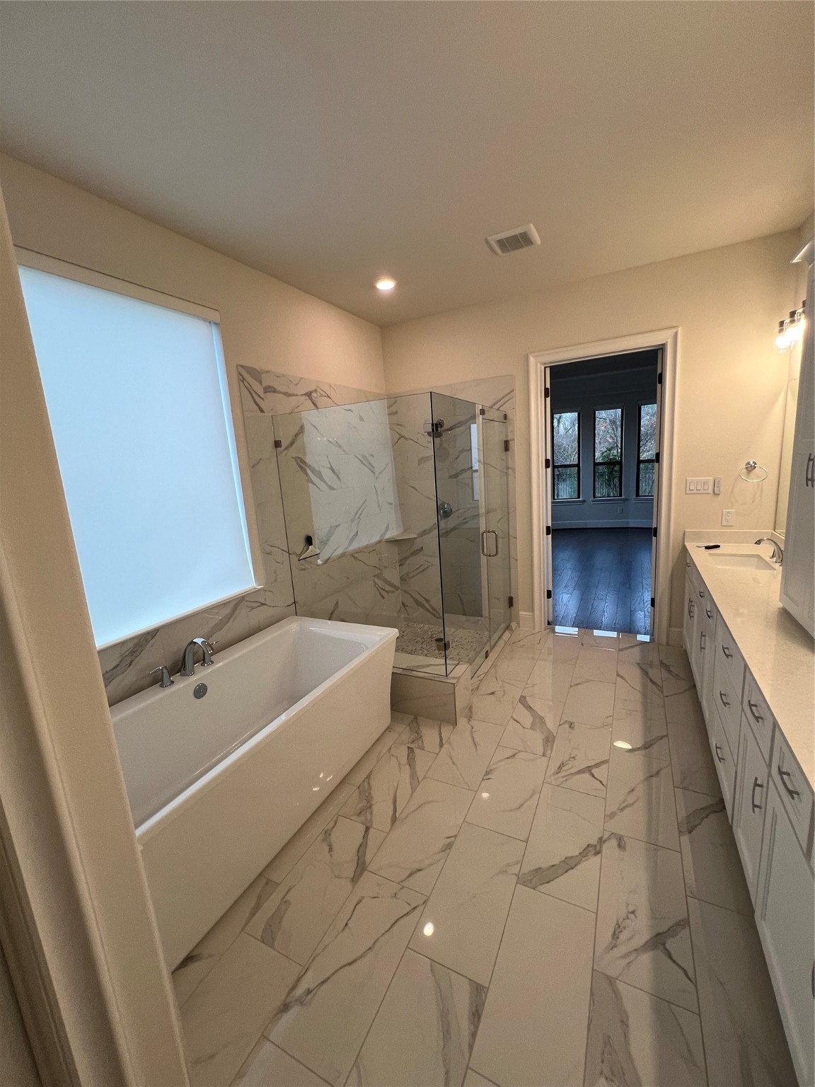 8526 Tombron Grove Road Magnolia, TX 77354 - Photo 19 of 20 a bathroom with a tub sink and mirror