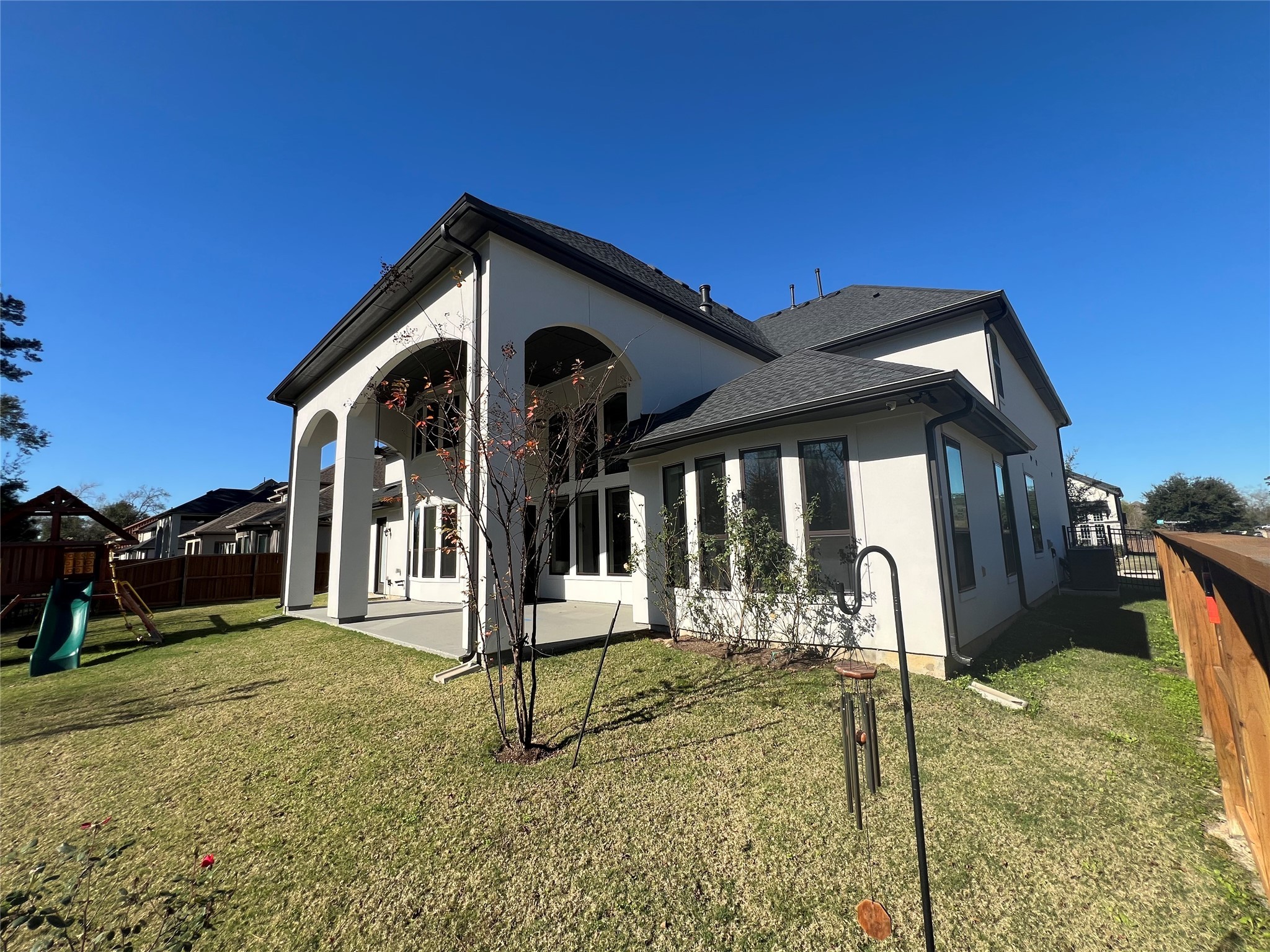 8526 Tombron Grove Road Magnolia, TX 77354 - Photo 6 of 20 a view of a house with backyard and porch