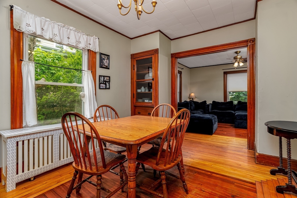 54 Charles Street Gardner, MA 01440 - Photo 14 of 40 a dining room with furniture window and wooden floor