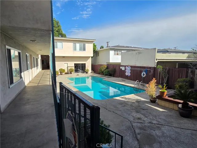 a view of pool with outdoor seating