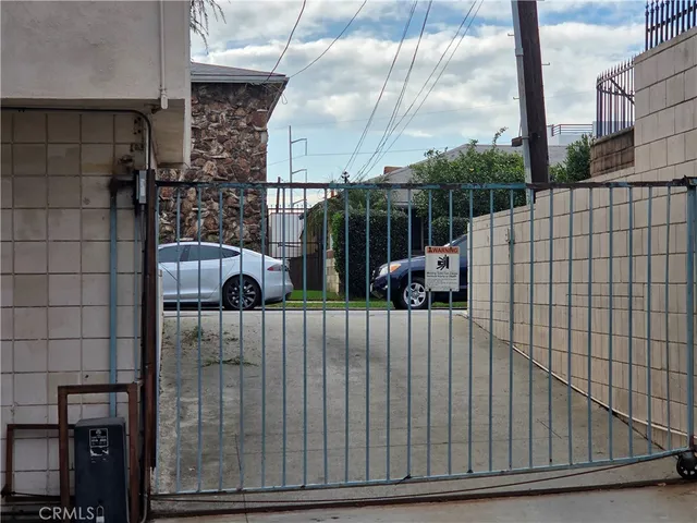 a view of a house with a street