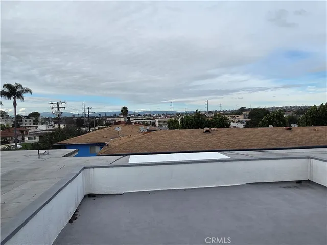 a view of a cars parked in a parking lot
