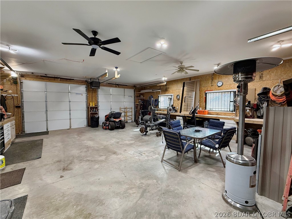 436 Country Mile Road Camdenton, MO 65020 - Photo 32 of 38 Drive through the garage.