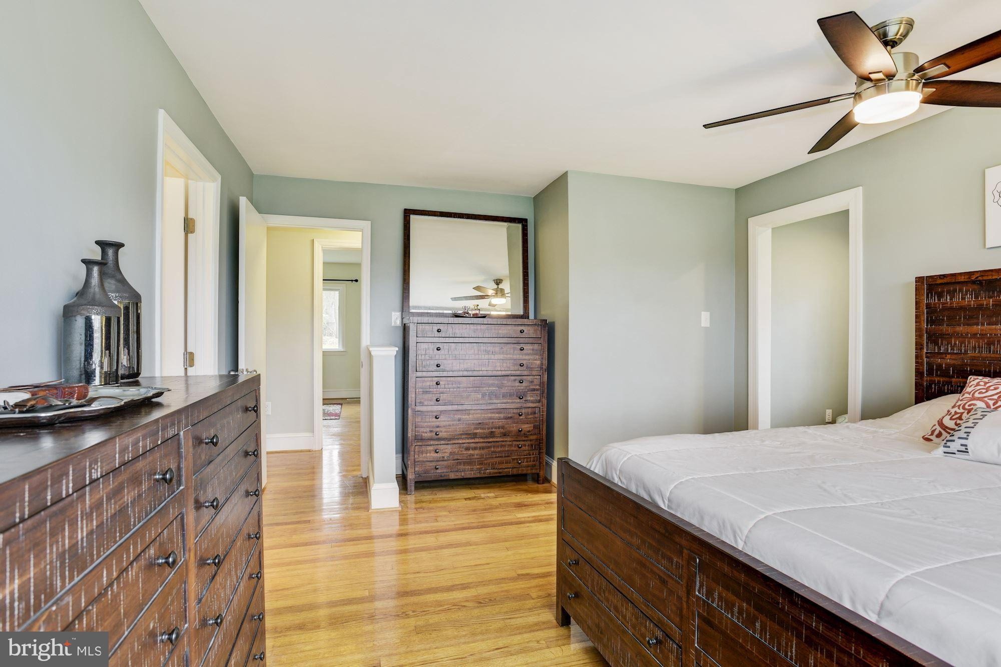 14545 Roxbury Road Glenelg, MD 21737 - Photo 18 of 34 Primary Bedroom | Hardwood Floors | Walk-In Closet