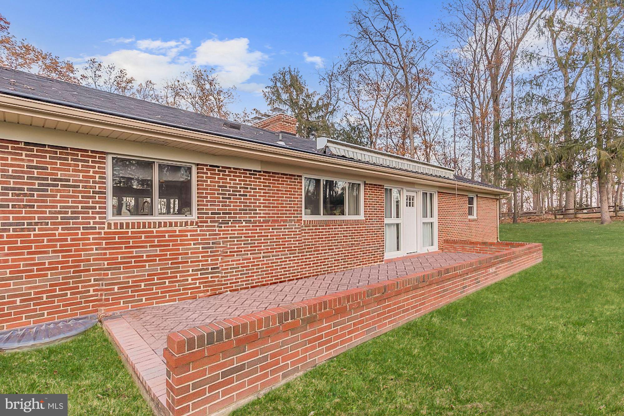14545 Roxbury Road Glenelg, MD 21737 - Photo 24 of 34 Expansive Brick Patio
