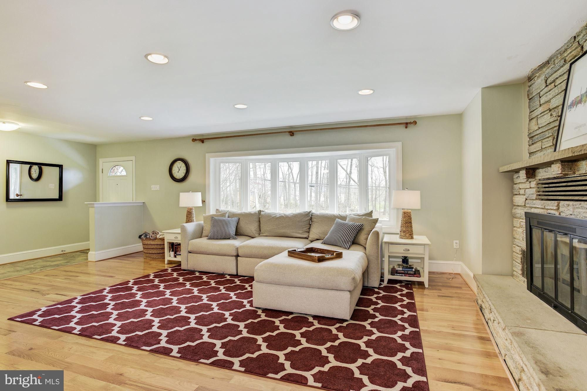 14545 Roxbury Road Glenelg, MD 21737 - Photo 4 of 34 Living Room | Hardwood Floors | Fireplace