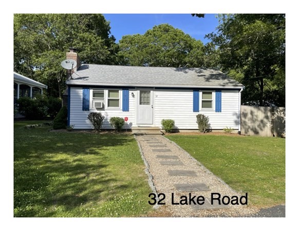 32 Lake Road Yarmouth, MA 02673 - Photo 17 of 17 a front view of a house with garden
