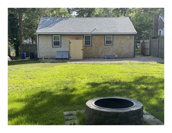 32 Lake Road Yarmouth, MA 02673 - Photo 3 of 17 a backyard of a house