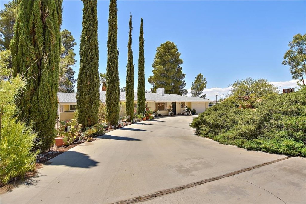 15700 Rimrock Road Apple Valley, CA 92307 - Photo 1 of 1 a view of a city with tall buildings and a street view