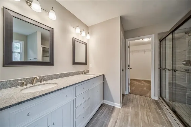 a view of a house with a small yard and wooden roof