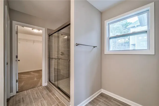 a view of a swimming pool with a yard