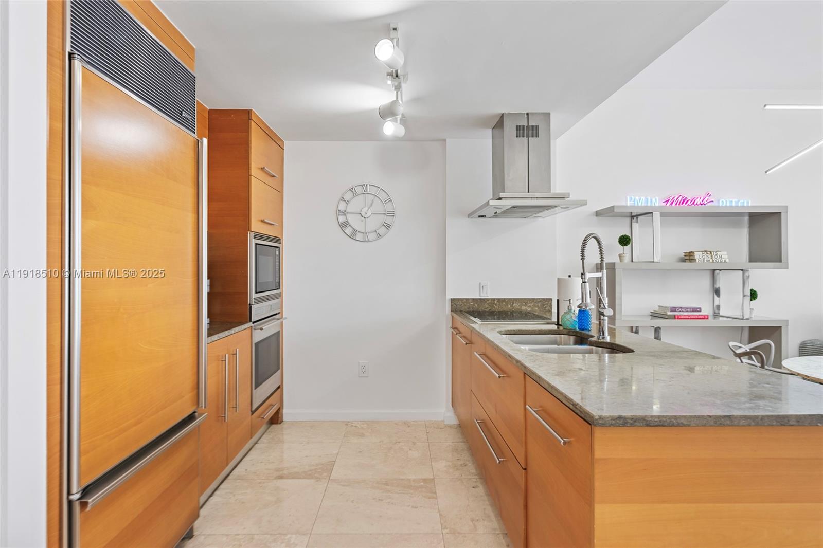 485 Brickell Avenue, Unit 3503 Miami, FL 33131 - Photo 3 of 23 a kitchen with stainless steel appliances granite countertop a sink and refrigerator
