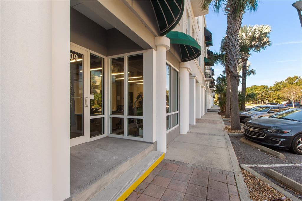 300 State Street East, Unit 206 Oldsmar, FL 34677 - Photo 23 of 23 a view of a house with a car park side of road