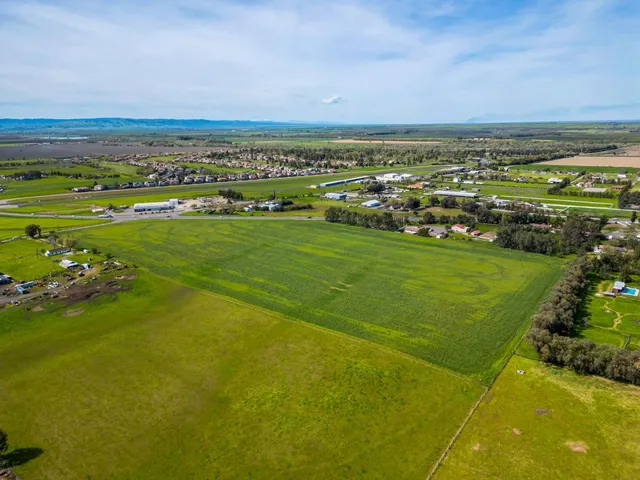 a view of a city with an ocean view