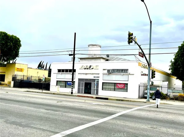 a view of a building with a street