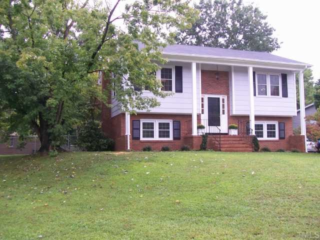 7512 Mine Shaft Road Raleigh, NC 27615 - Photo 1 of 12 a view of a yard in front of a house