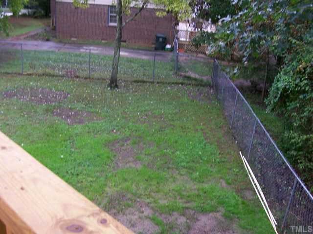 7512 Mine Shaft Road Raleigh, NC 27615 - Photo 12 of 12 a view of a backyard with a garden