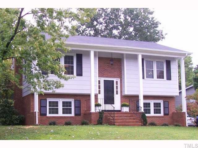 7512 Mine Shaft Road Raleigh, NC 27615 - Photo 2 of 12 front view of a house with a yard