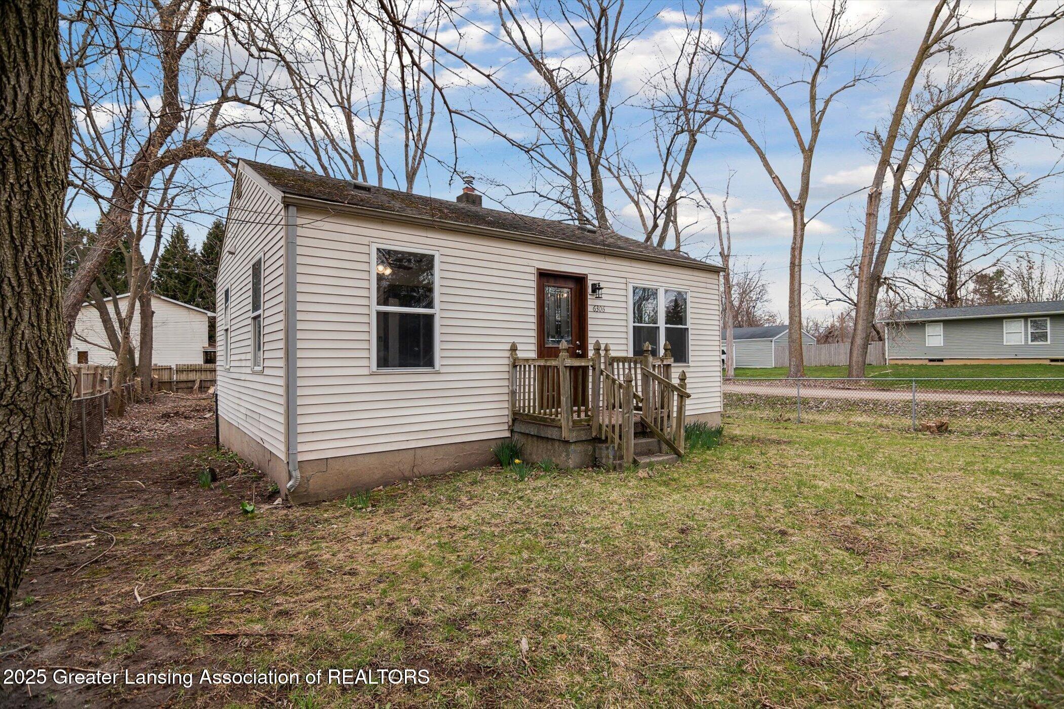6306 Grovenburg Road Lansing, MI 48911 - Photo 3 of 31 02-6306-Grovenburg-Rd-Lansing-MI-48911-W
