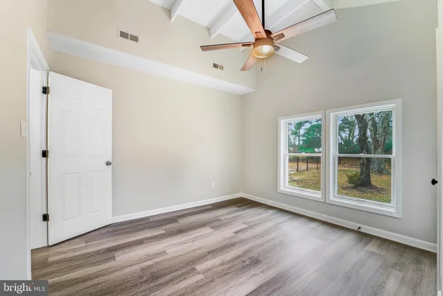 a view of a house with a snow in the yard