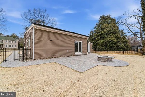 a view of a house with a snow in the yard