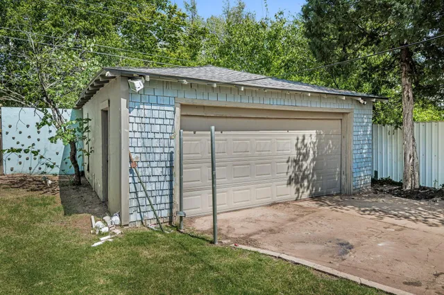 a view of a house with a garage