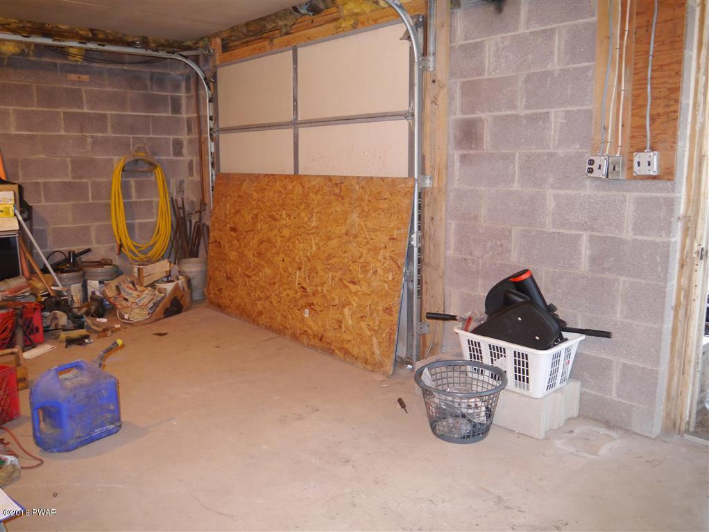 317 Leonard Road Pleasant Mount, PA 18453 - Photo 24 of 24 Overhead door basement
