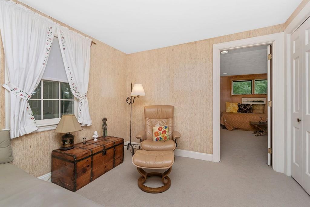 142 Kirkstall Road Newton, MA 02460 - Photo 14 of 23 a living room with furniture and a window