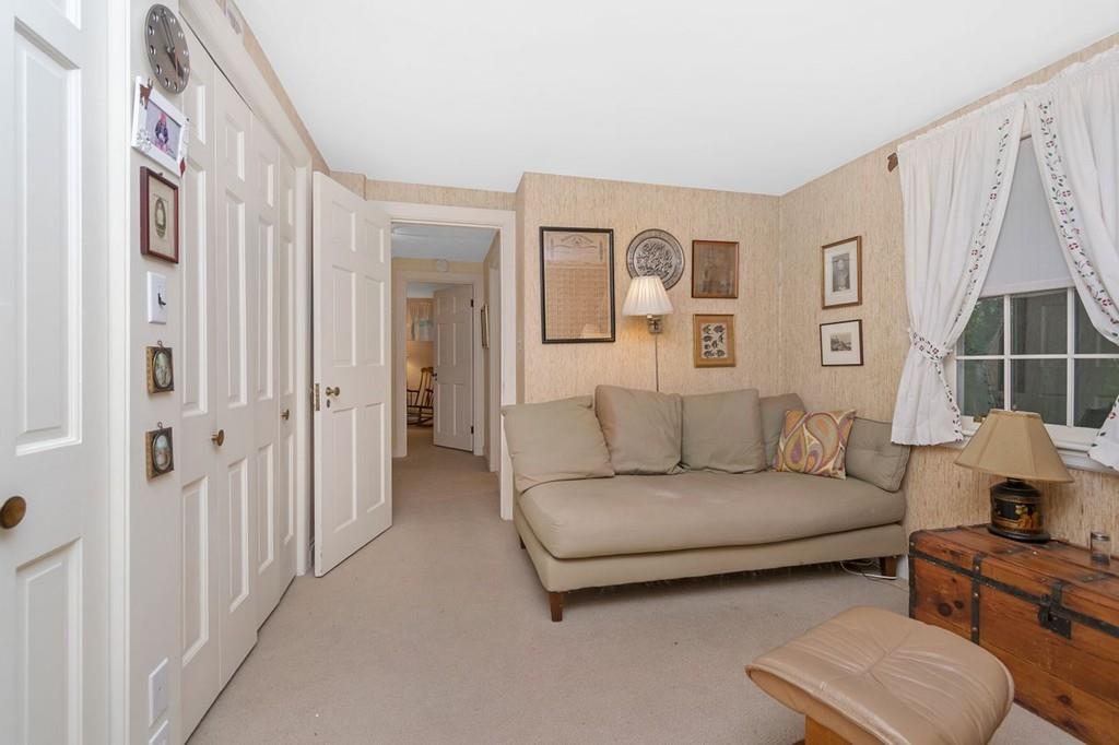 142 Kirkstall Road Newton, MA 02460 - Photo 15 of 23 a living room with furniture and a window