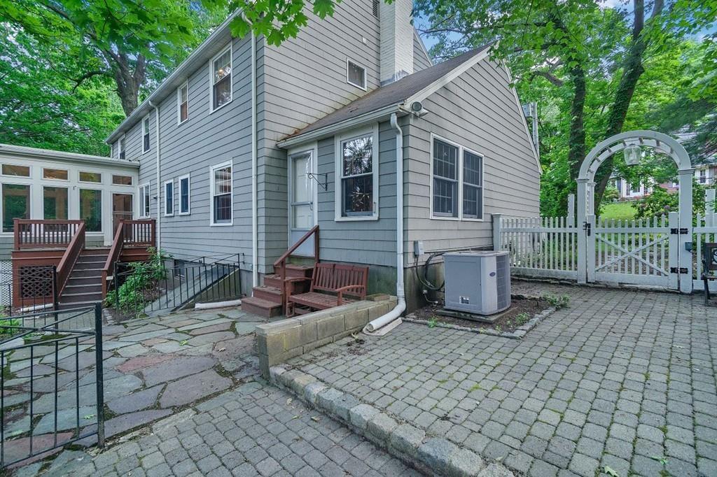 142 Kirkstall Road Newton, MA 02460 - Photo 20 of 23 a front view of a house with garden