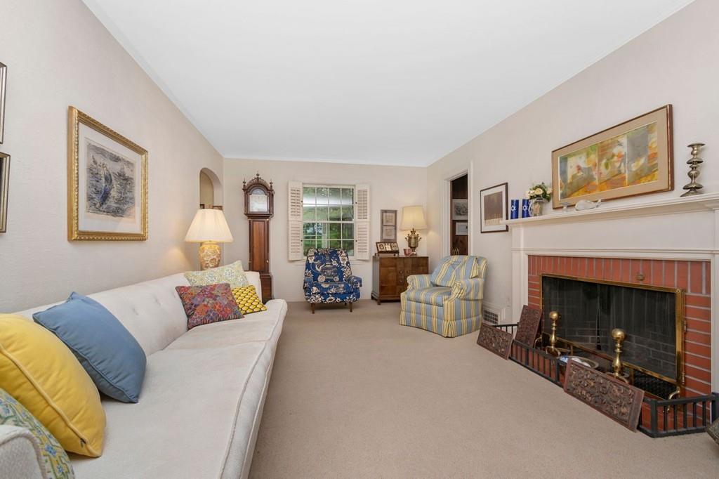 142 Kirkstall Road Newton, MA 02460 - Photo 4 of 23 a living room with furniture and a fireplace